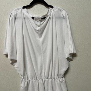 WHite dolman short sleeve top, with band at the waist. White size Large